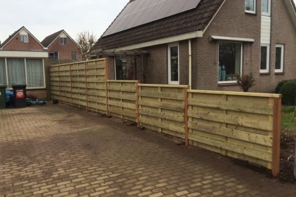 Uitgaan van Gewoon deelnemen Houten schutting | Wim Koster Tuinhout